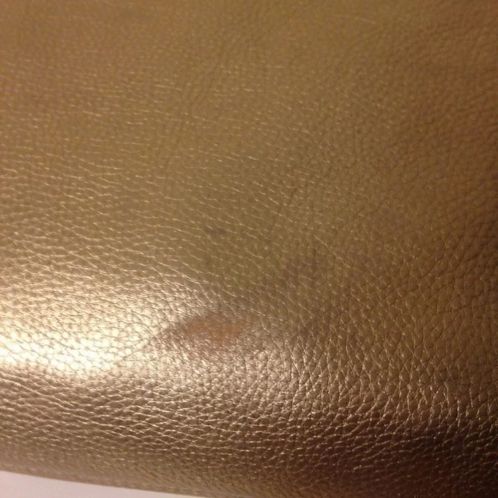 Michael Kors gold metallic leather bag